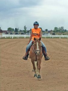 young women barrel racer in indiana riata arena